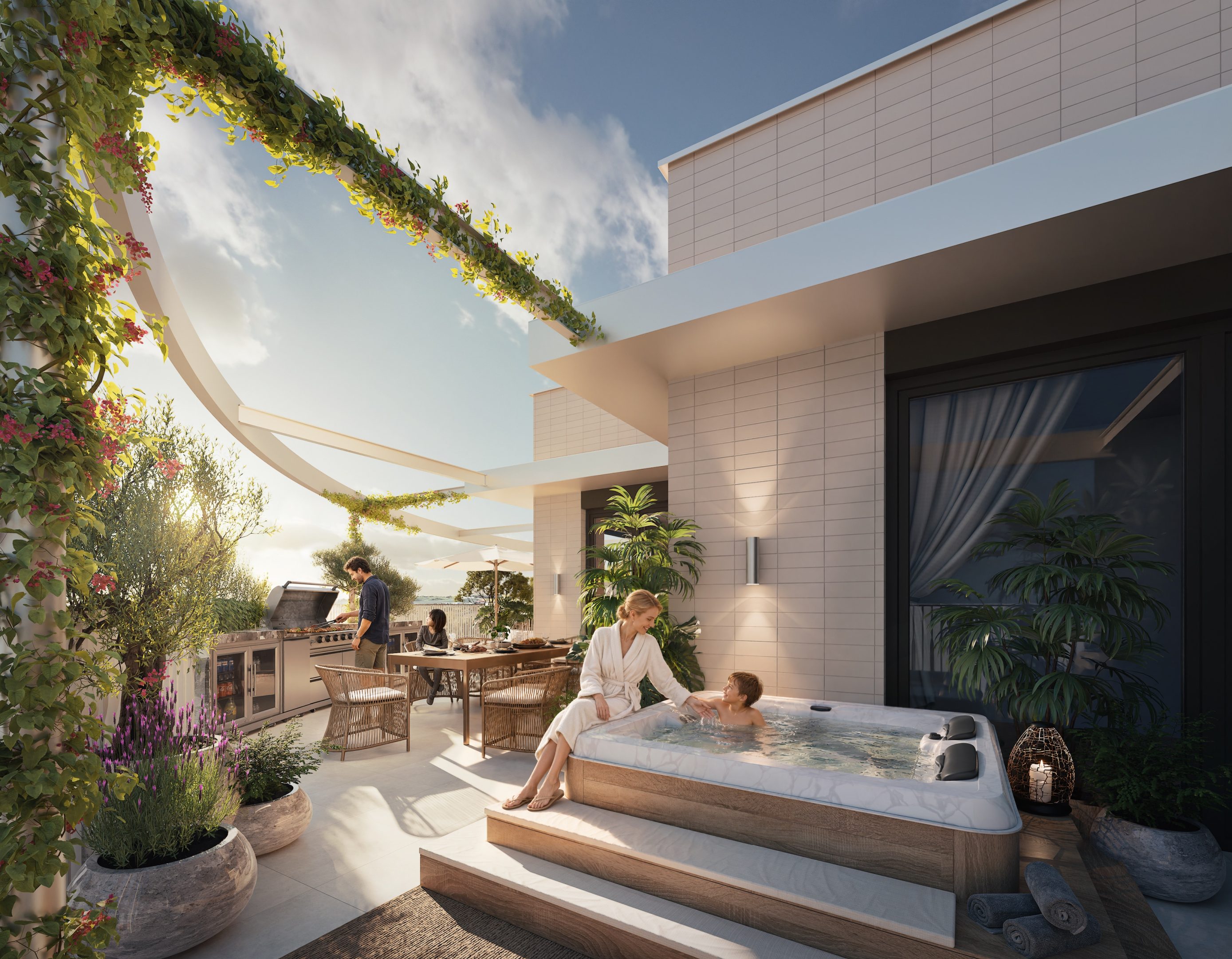 Střešní terasa penthousu Zanzara s vířivkou, pergolou porostlou zelení a grilovacím koutem při západu slunce